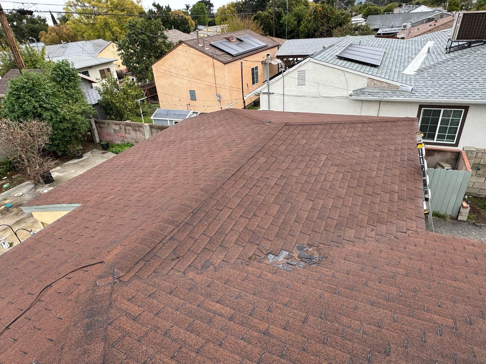 Professional roof repair services - fixing damaged shingles